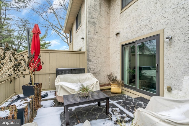 view of snow covered patio