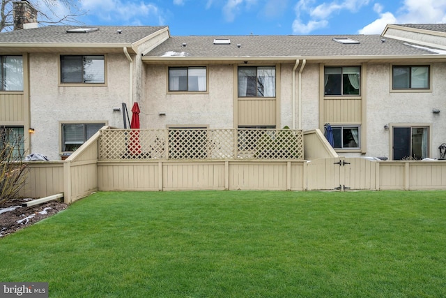 exterior space with a lawn