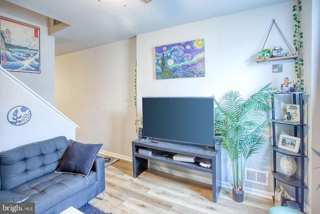 living room with hardwood / wood-style flooring