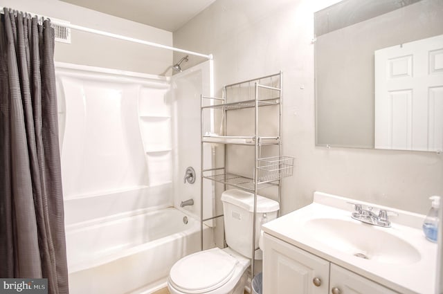 full bathroom with vanity, toilet, and shower / bath combo with shower curtain