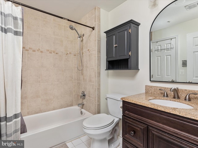 full bathroom featuring shower / tub combo, vanity, tile patterned floors, and toilet