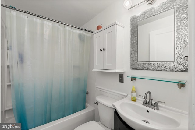 full bathroom featuring shower / bath combo, vanity, and toilet