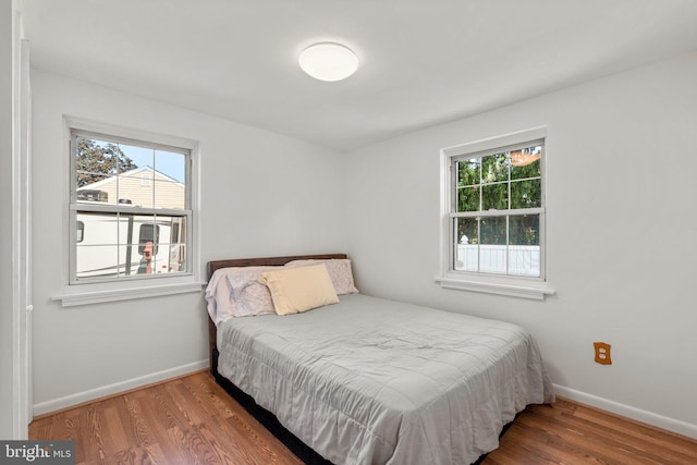 bedroom featuring hardwood / wood-style flooring