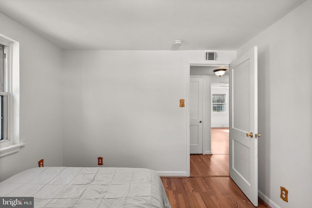 bedroom featuring light hardwood / wood-style floors