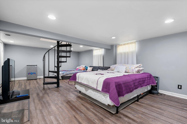 bedroom featuring wood-type flooring