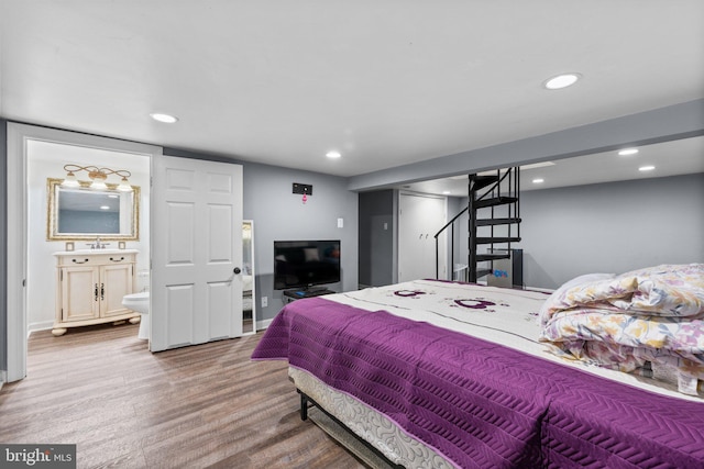 bedroom featuring connected bathroom