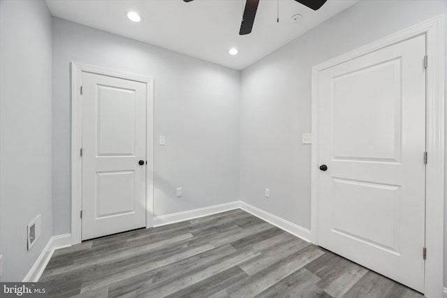 unfurnished room featuring light hardwood / wood-style floors and ceiling fan