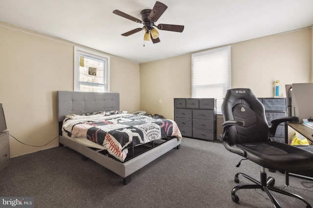 carpeted bedroom with ceiling fan