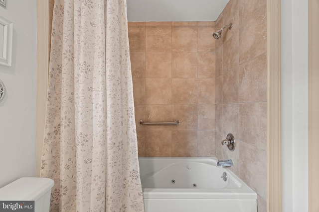 bathroom featuring tiled shower / bath combo