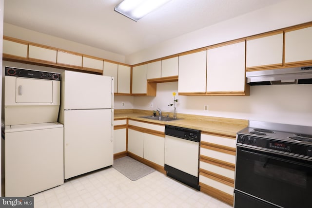 3310 N Leisure World Blvd Unit 6-612, Silver Spring, MD 20906 - kitchen featuring stacked washer / drying machine, white appliances, sink, and white cabinets