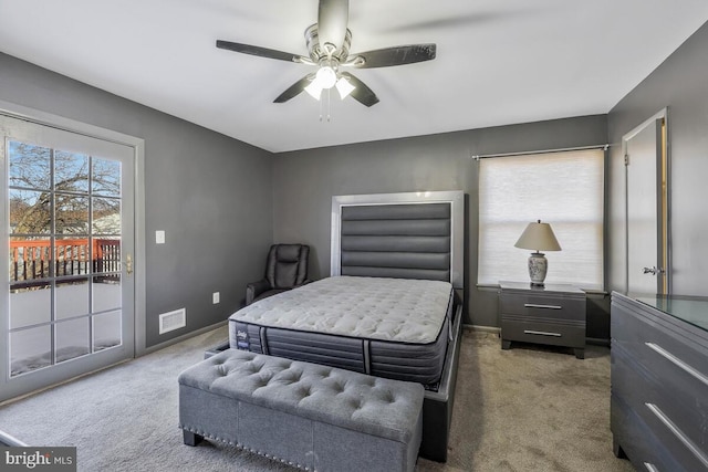 carpeted bedroom with access to outside and ceiling fan