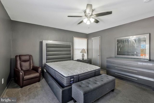 bedroom with dark carpet and ceiling fan