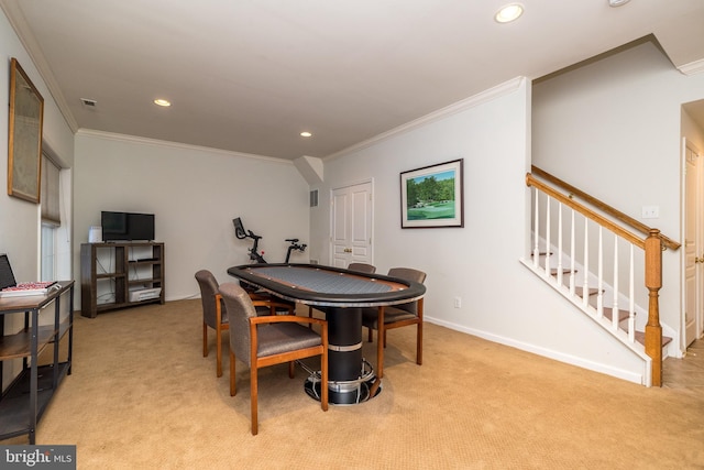 rec room featuring crown molding and light colored carpet