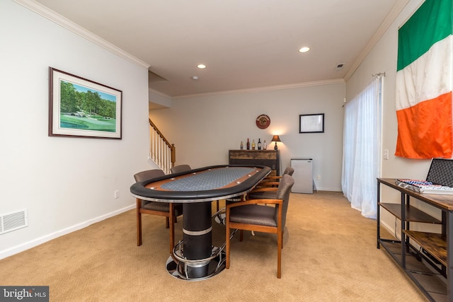 game room featuring light colored carpet and ornamental molding