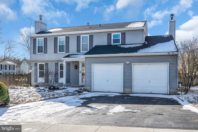 front facade with a garage