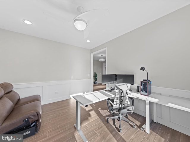 office area featuring recessed lighting, wood tiled floor, and wainscoting