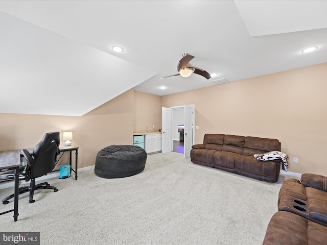 living room featuring carpet flooring, visible vents, and baseboards