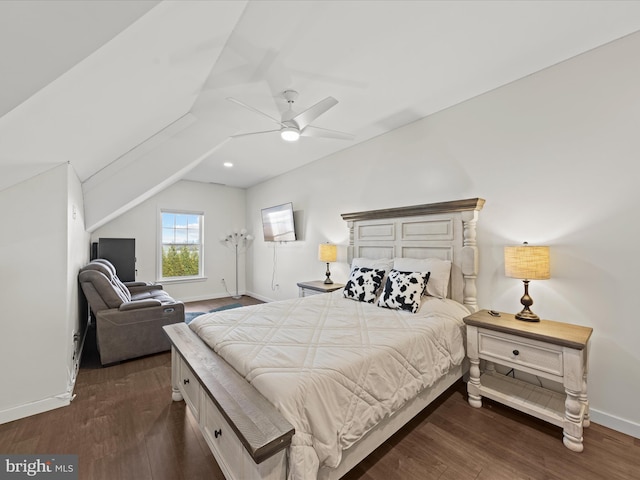 bedroom featuring dark wood-style floors, ceiling fan, vaulted ceiling, and baseboards