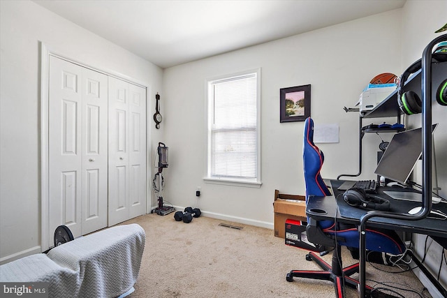 view of carpeted office space