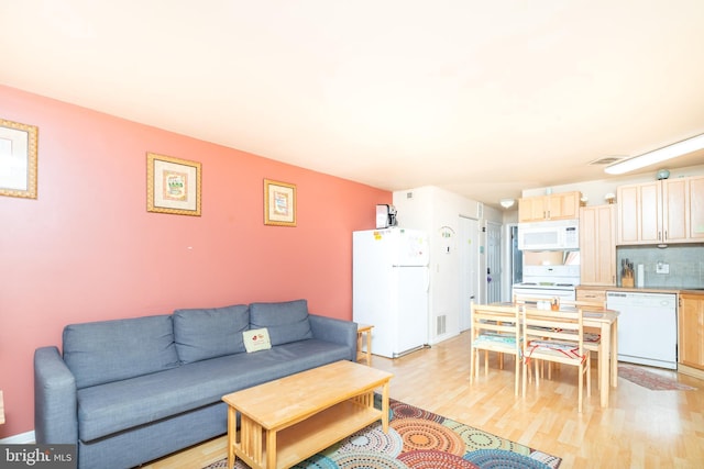 living room featuring light hardwood / wood-style floors