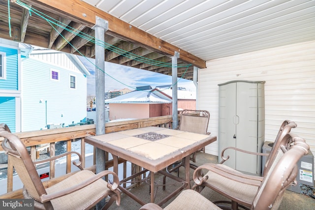 view of patio / terrace featuring a fire pit