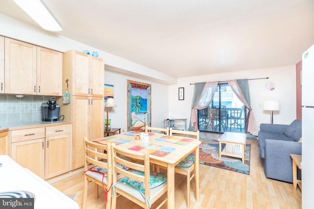 dining space featuring light hardwood / wood-style flooring