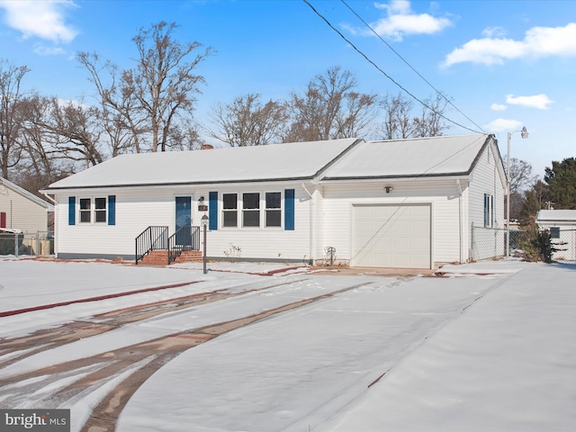 ranch-style home with a garage