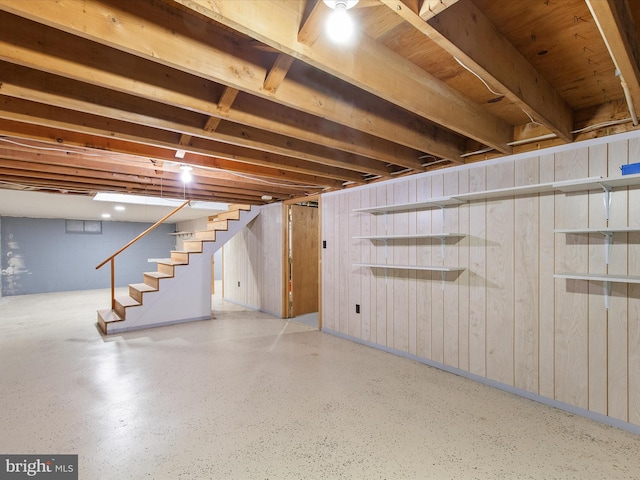 basement with wood walls