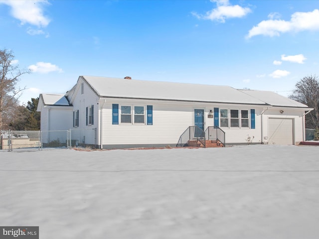 ranch-style house featuring a garage