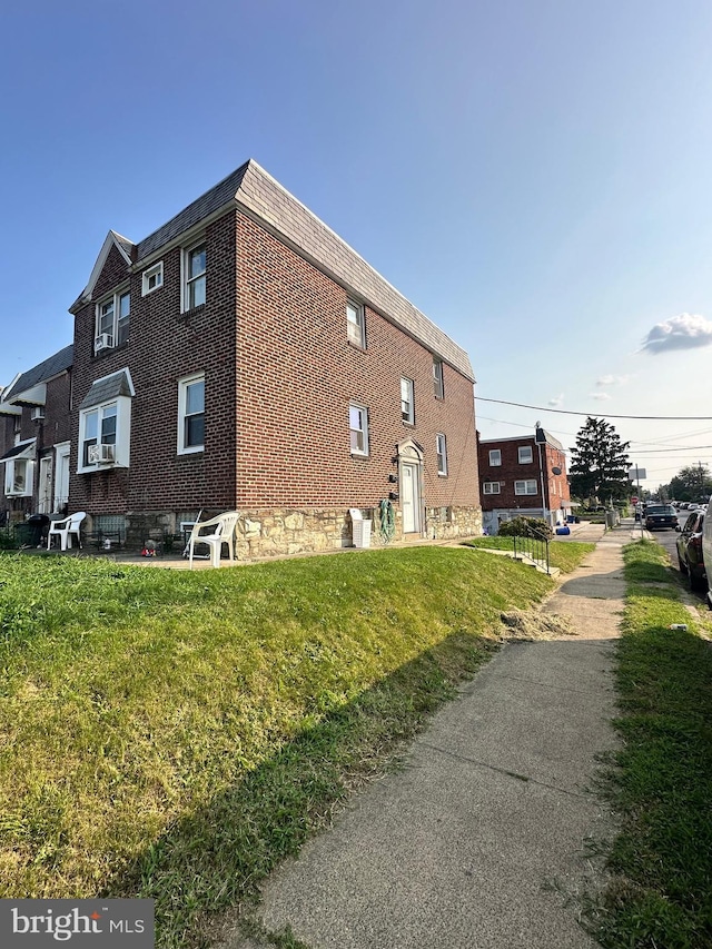 view of property exterior featuring a yard