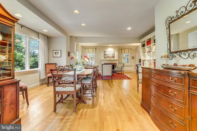 dining area featuring light wood-type flooring