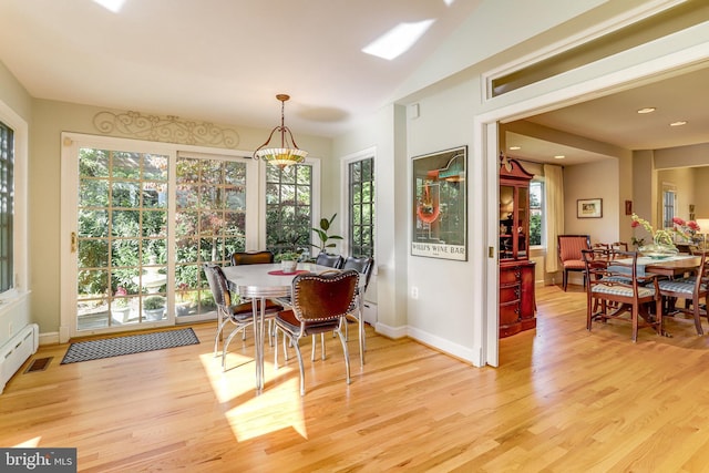 dining room with light wood-type flooring