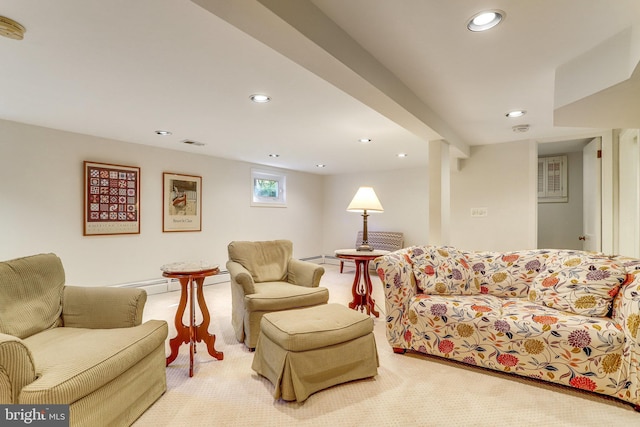 living room with light colored carpet and beam ceiling