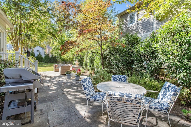 view of patio / terrace featuring outdoor lounge area and area for grilling