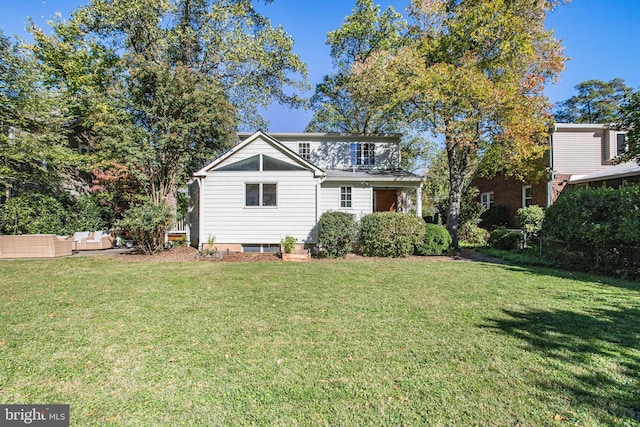 view of front of home featuring an outdoor hangout area and a front yard