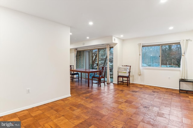 unfurnished dining area with light parquet floors