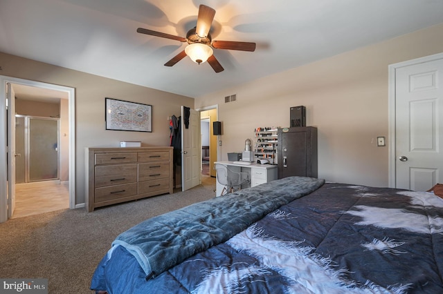 bedroom with ceiling fan and light colored carpet