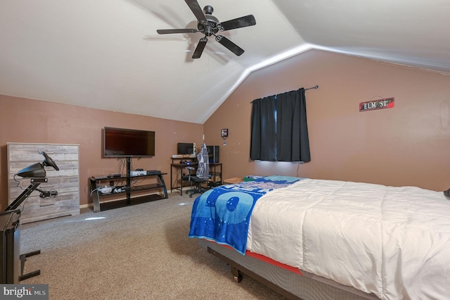 bedroom with ceiling fan, carpet, and lofted ceiling