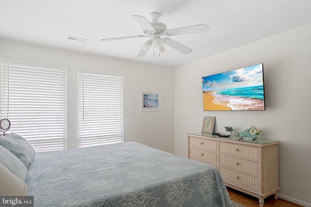 bedroom featuring ceiling fan and hardwood / wood-style floors