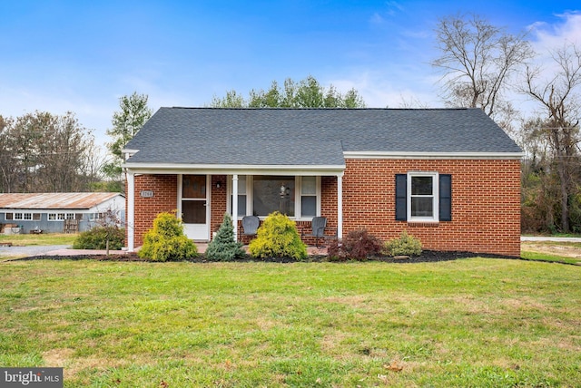 view of front of property with a front lawn