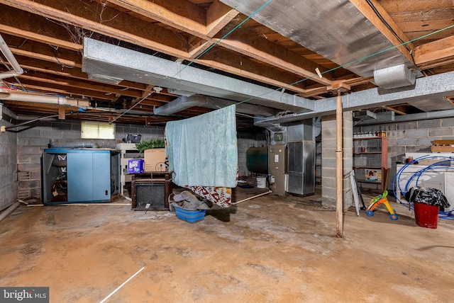 basement featuring heating unit