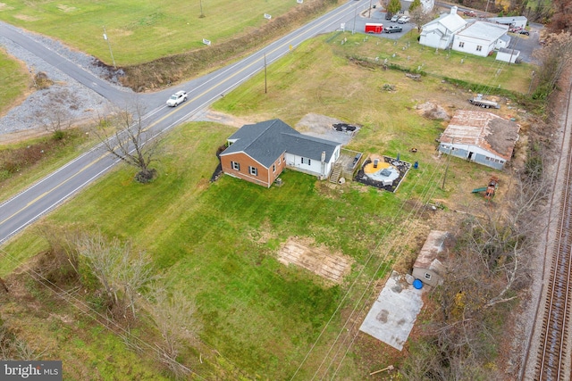 birds eye view of property featuring a rural view