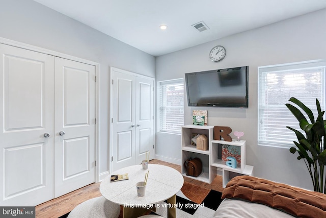 sitting room featuring light wood-type flooring