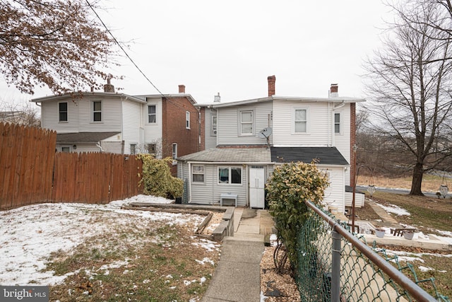 view of snow covered house