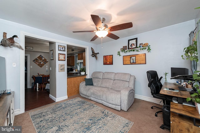 home office with carpet and ceiling fan