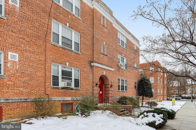 view of snow covered property