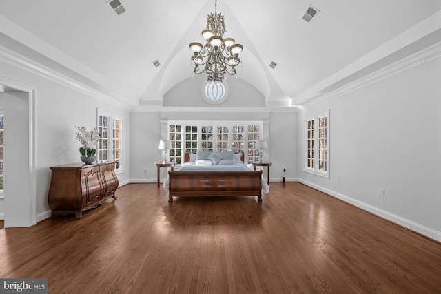 bedroom with vaulted ceiling, an inviting chandelier, and dark hardwood / wood-style flooring