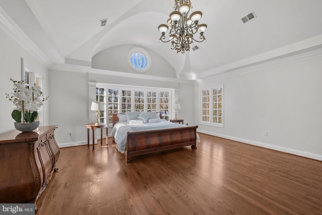 bedroom with vaulted ceiling, an inviting chandelier, crown molding, and dark hardwood / wood-style floors