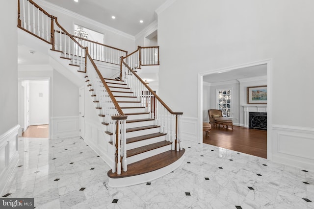 staircase with crown molding