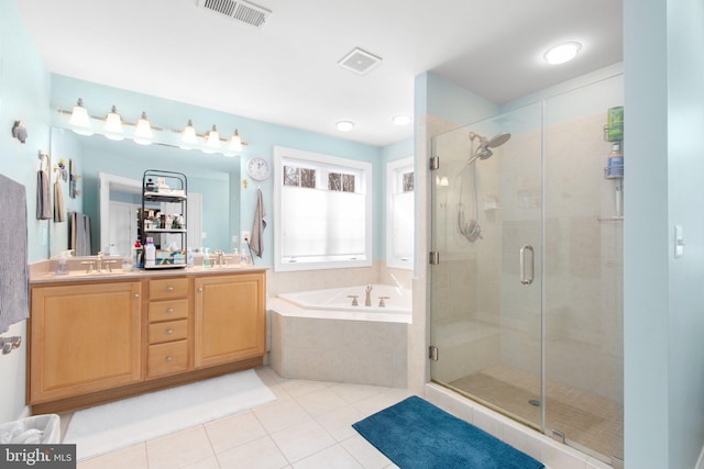 bathroom featuring vanity, tile patterned floors, and independent shower and bath